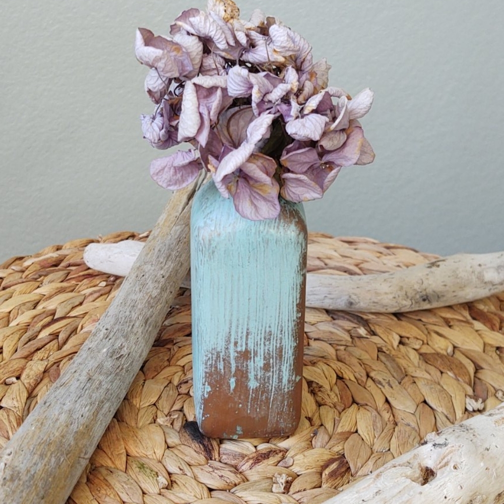 Green patina bottle